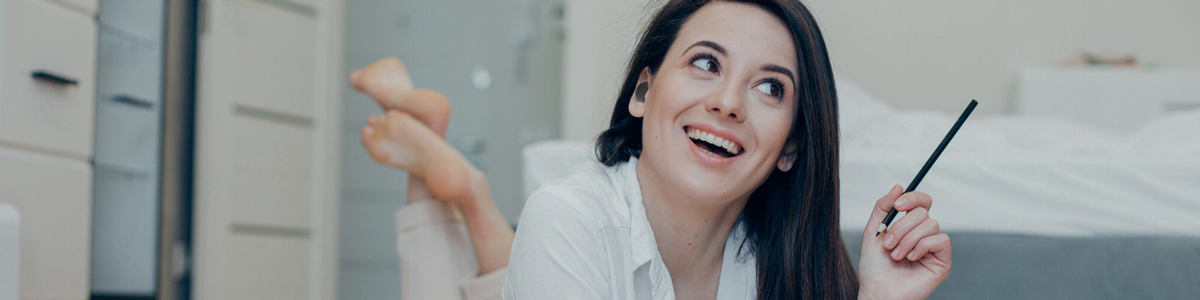 Women loving her comply tips with her earbuds
